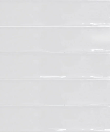Glossy white rectangular wall tiles with subtle texture, ideal for kitchen backsplash or bathroom decor.