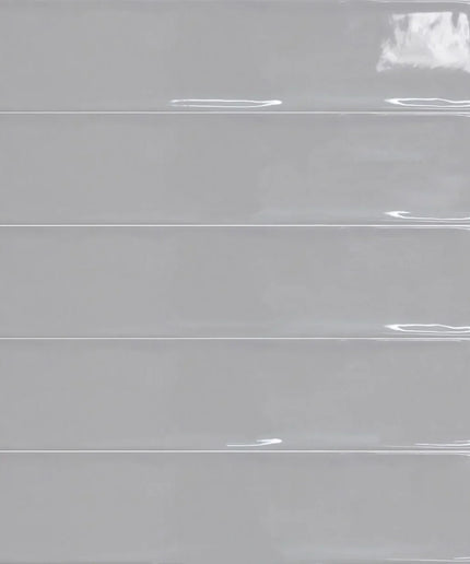 Glossy light gray rectangular wall tiles, ideal for bathrooms, showers, and kitchen backsplash.