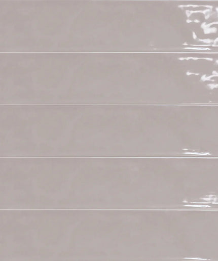 Glossy mauve rectangular ceramic wall tiles with a subtle textured finish, arranged in horizontal rows.