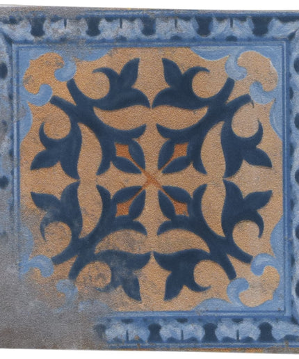 Decorative tile with blue and beige pattern on a white background