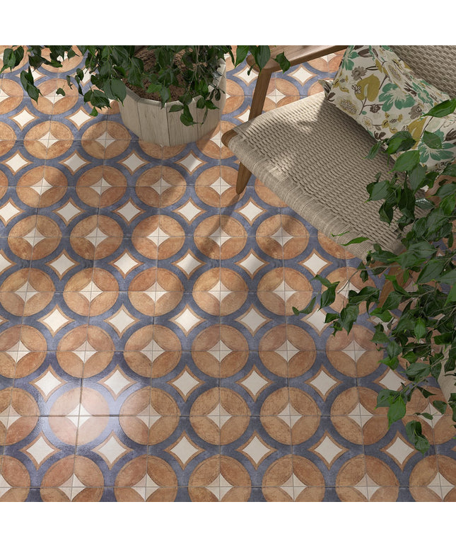 Patterned tile floor with a chair and plants