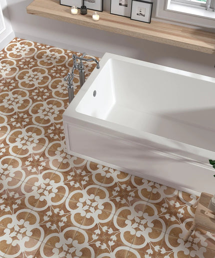Bathroom with a white bathtub on a patterned floor