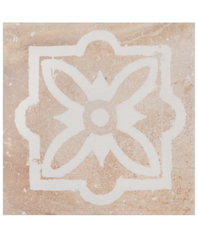 Decorative tile with a white floral design on a beige background