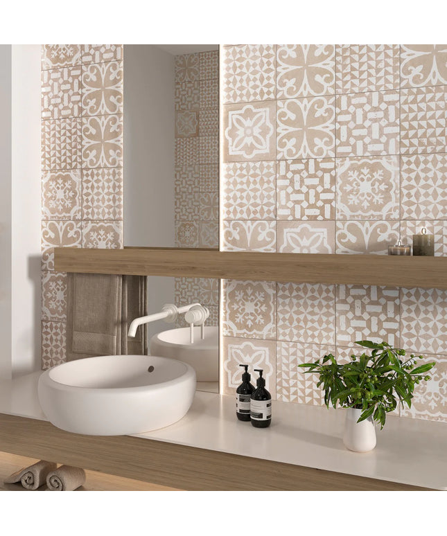Bathroom with decorative tiles, sink, and plants