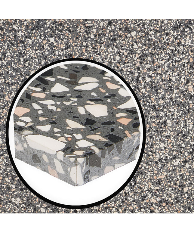 Terrazzo patterned stone with a circular inset on a similar terrazzo background