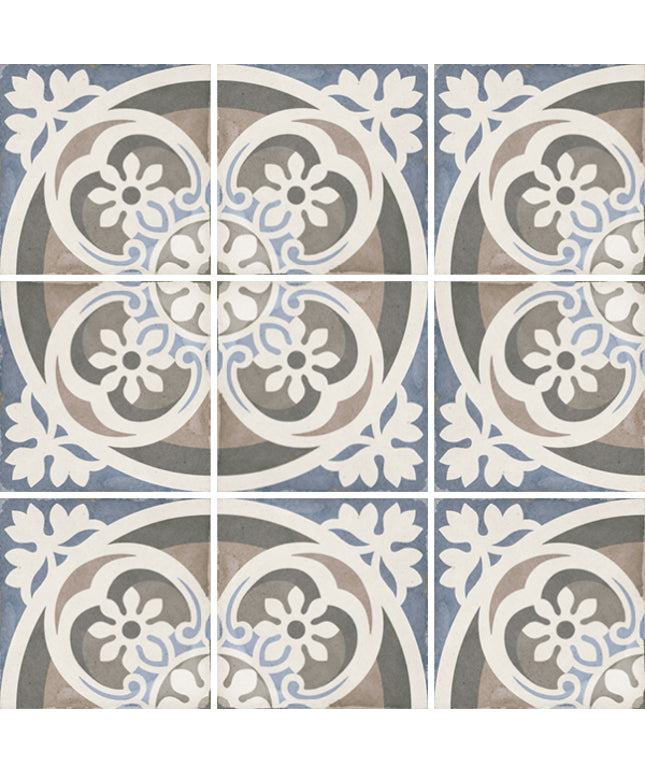 Decorative tiles with floral patterns in blue, gray, and white.
