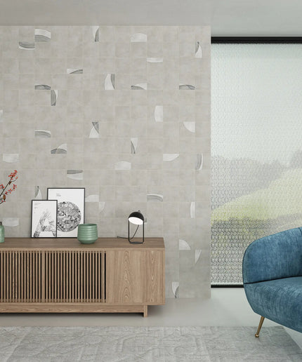 Modern living room with a wooden sideboard, blue sofa, and decorative items.