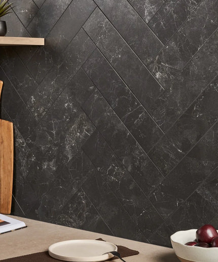 Black marble-look porcelain tile in herringbone pattern, kitchen backsplash setting