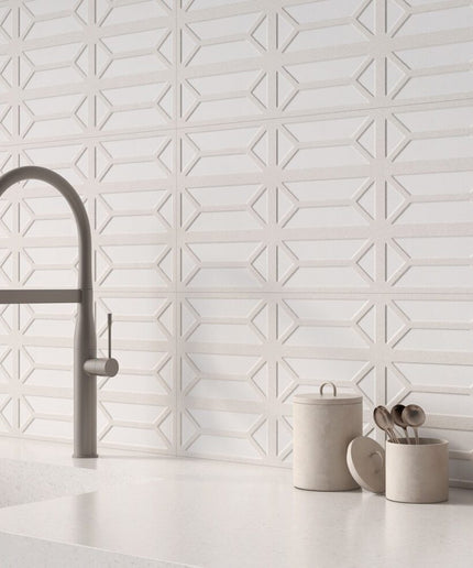 Ivory bevel ceramic tile backsplash with geometric pattern in a modern kitchen setting