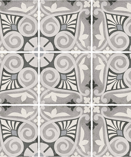 Set of decorative tiles with geometric patterns in gray and white.