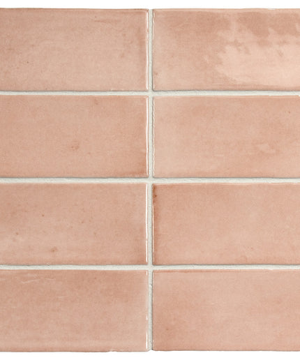 Set of pink tiles arranged in a grid pattern on a white background