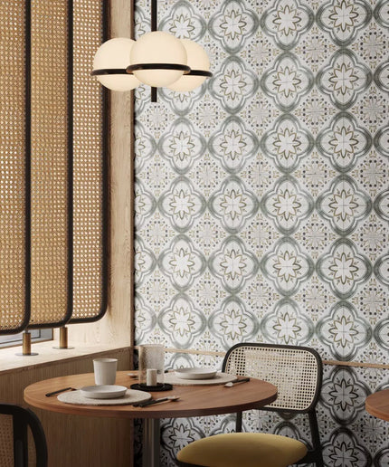 Dining area with patterned wallpaper, round table, and chairs.
