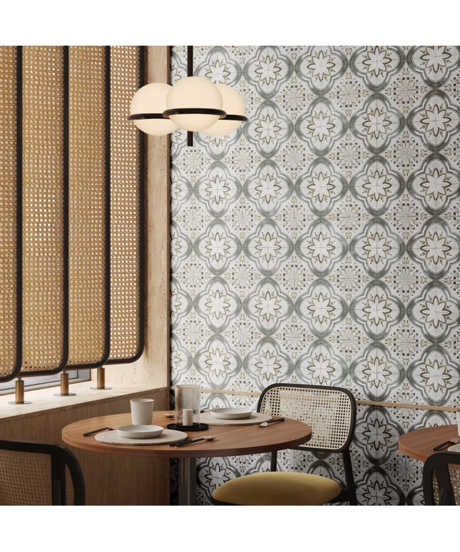 Dining area with patterned wallpaper, round table, and chairs.