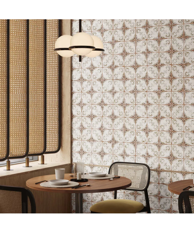 Dining area with patterned wall, round table, and chairs.