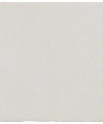 Plain white tile on a white background