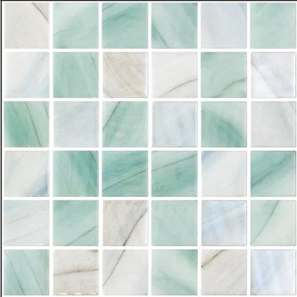 Mosaic pattern of light blue and white tiles
