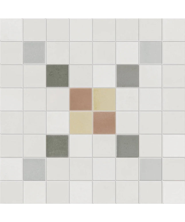 Pattern of small square tiles in various colors on a white background