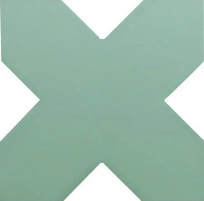 A sage green geometric X-shaped tile or panel with white triangular cutouts at the intersections, shown against a white background.