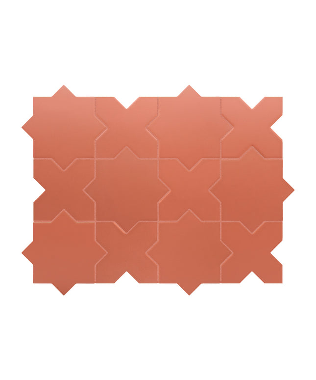 Terracotta-colored interlocking geometric mosaic tiles arranged in a grid pattern on a white background.