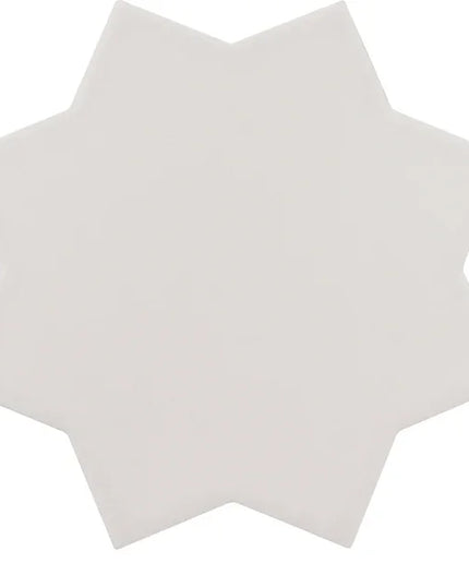 A single star-shaped ceramic tile in a warm off-white or cream color, shown against a plain white background.