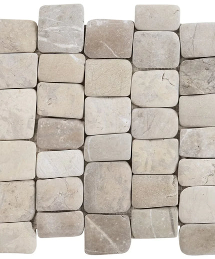 Pattern of beige stone tiles arranged in a grid on a white background