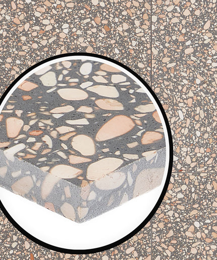 Close-up of a terrazzo pattern with a circular inset showing a detailed view.