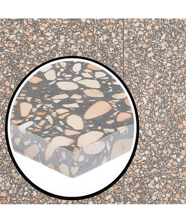 Close-up of a terrazzo pattern with a circular inset showing a detailed view.