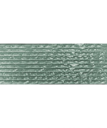 Riviera 3x18 green glass tile with textured, wavy surface for kitchen or bathroom walls