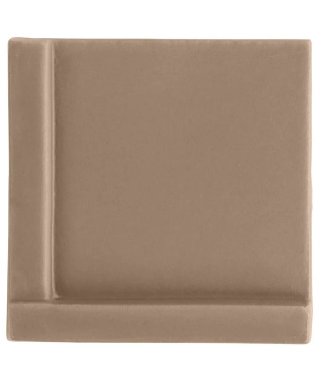 Brown square tile with a subtle pattern on a white background