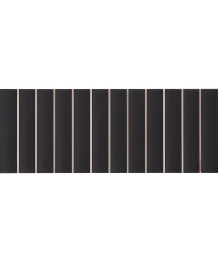 Black rectangular tile with gold border on a white background