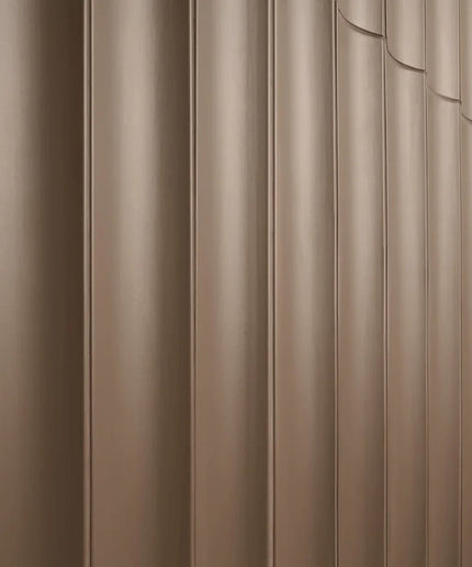 Taupe fluted column tiles with a smooth, vertical grooved surface, modern wall decor.