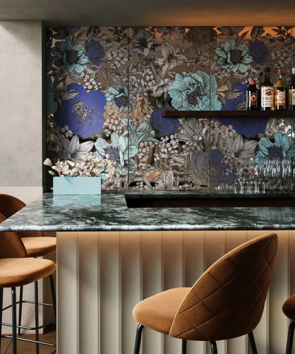 Modern bar with fluted white wall tiles, marble countertop, and floral backsplash
