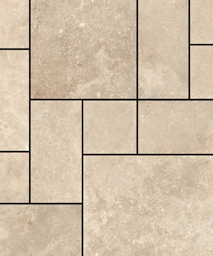 Beige tiles arranged in a herringbone pattern
