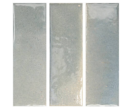 Three rectangular stone tiles with a grayish-blue color on a white background