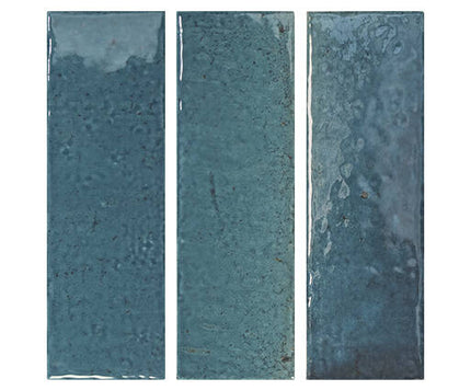 Three rectangular tiles with a textured blue surface on a white background