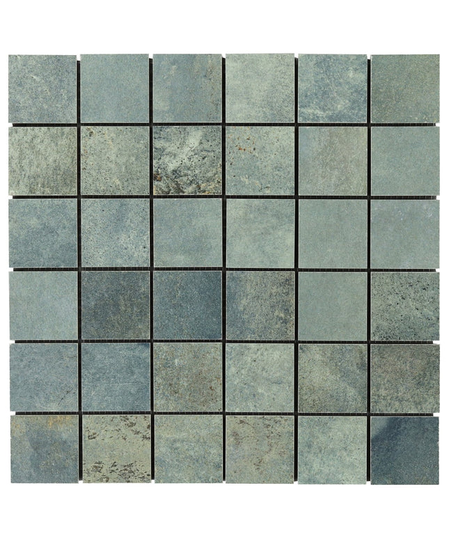 Mosaic pattern of square tiles in various shades of blue and gray.