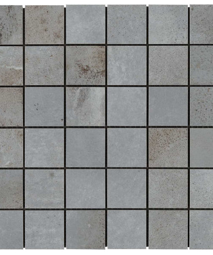Mosaic tile pattern with gray and beige tiles on a white background