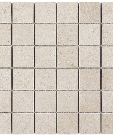 Beige square tiles with thin black grout lines on a white background made in the USA