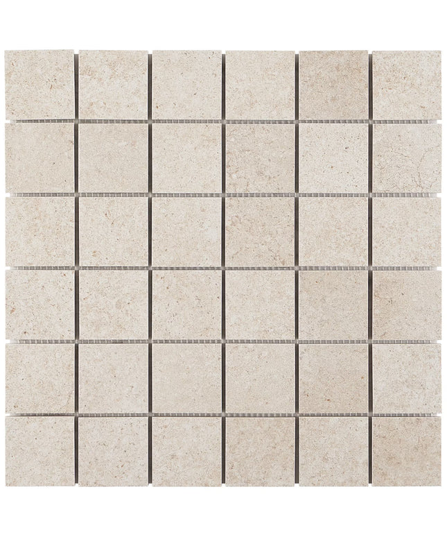 Beige square tiles with thin black grout lines on a white background made in the USA