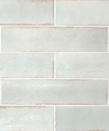 Pattern of light blue tiles with a subtle texture