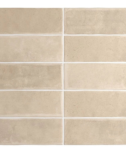 Beige tiles arranged in a grid pattern on a white background