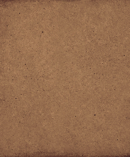 A square brown textured surface with a distressed, vintage paper or stone-like finish and darker worn edges.