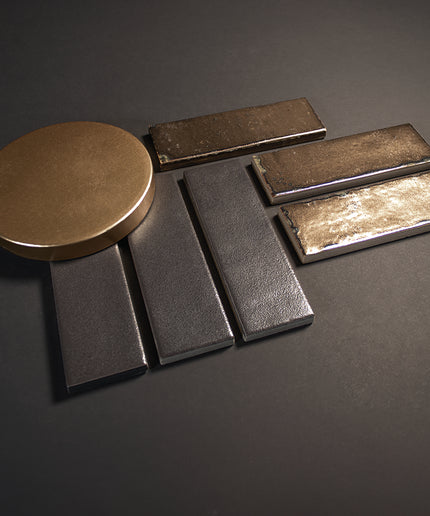 Collection of metallic objects on a dark surface