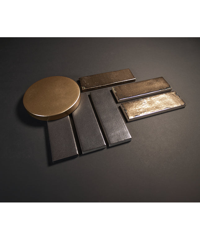 Collection of metallic objects on a dark surface