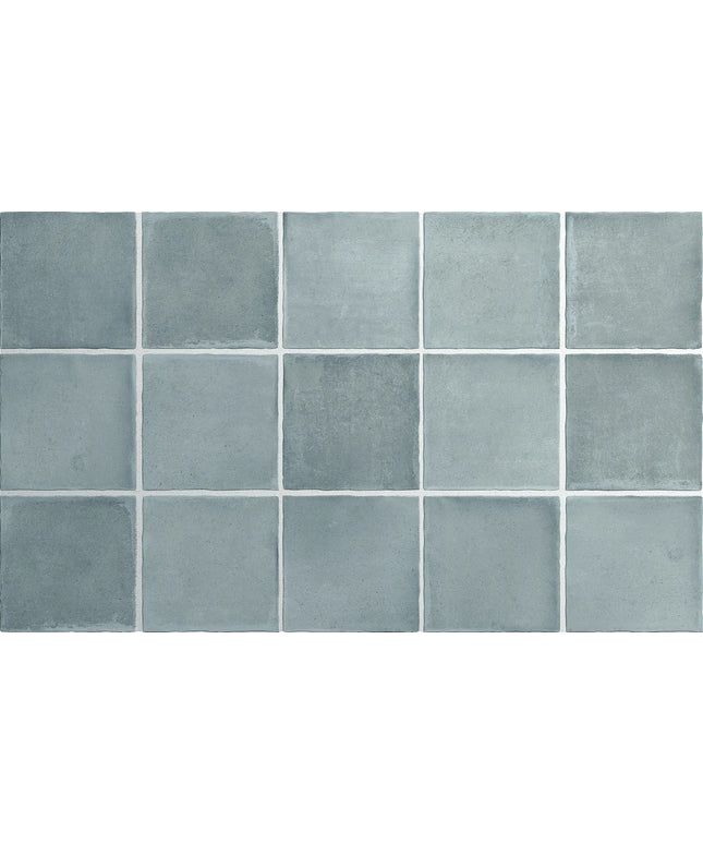 Grid of blue tiles with a textured surface