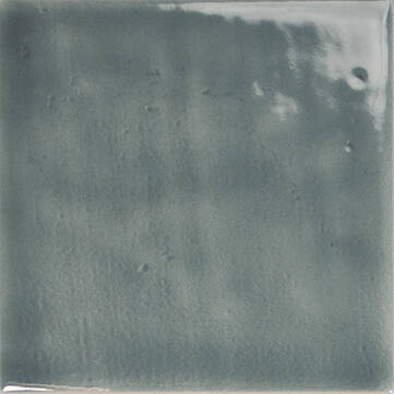 A square glossy ceramic tile with a textured, matte slate gray finish.