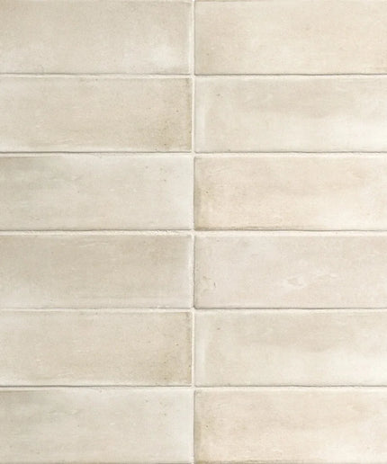 Beige matte 2x6 subway tiles with a smooth finish, ideal for kitchen backsplash or bathroom walls.