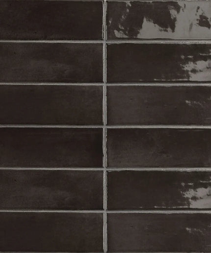 Glossy black 2x6 subway tiles with subtle texture, ideal for backsplash or shower walls