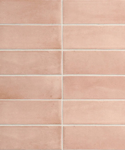 Pink matte 2x6 ceramic tiles in a subway pattern, ideal for backsplash or bathroom walls