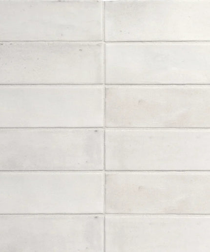 White matte 2x6 subway tiles with subtle texture, ideal for backsplash or bathroom walls